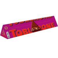 Шоколад молочний Toblerone з родзинками та нугою з меду та мигдалю, 100 г